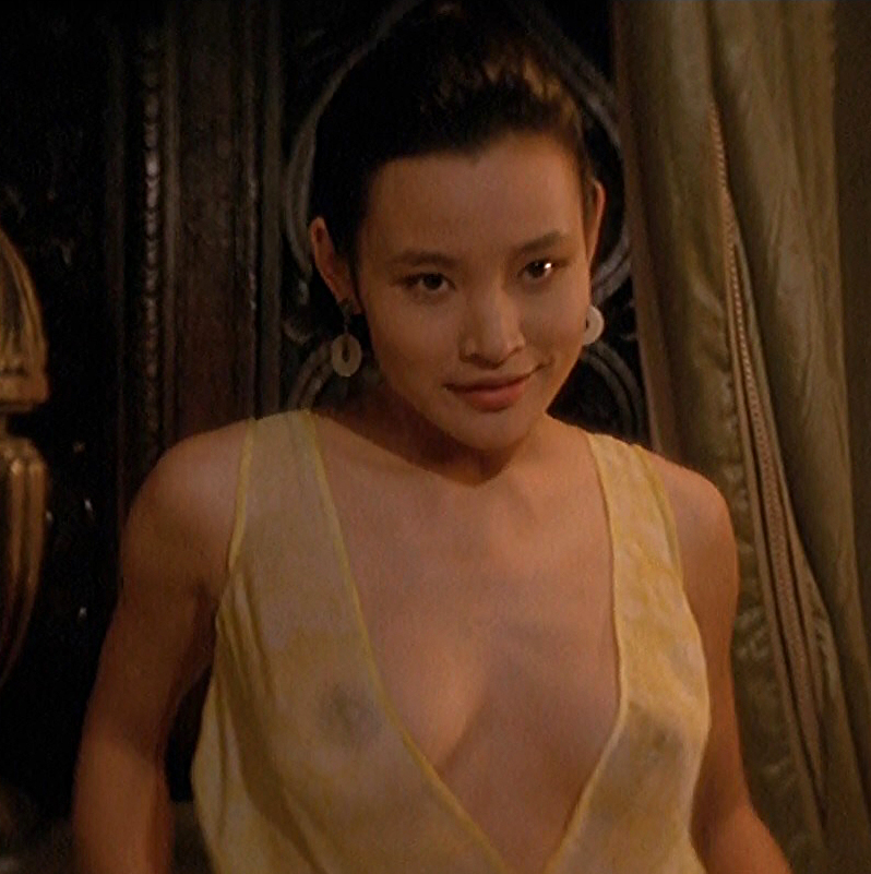 Joan Chen exposes her juicy tits and nipples in a sexy scene.&...