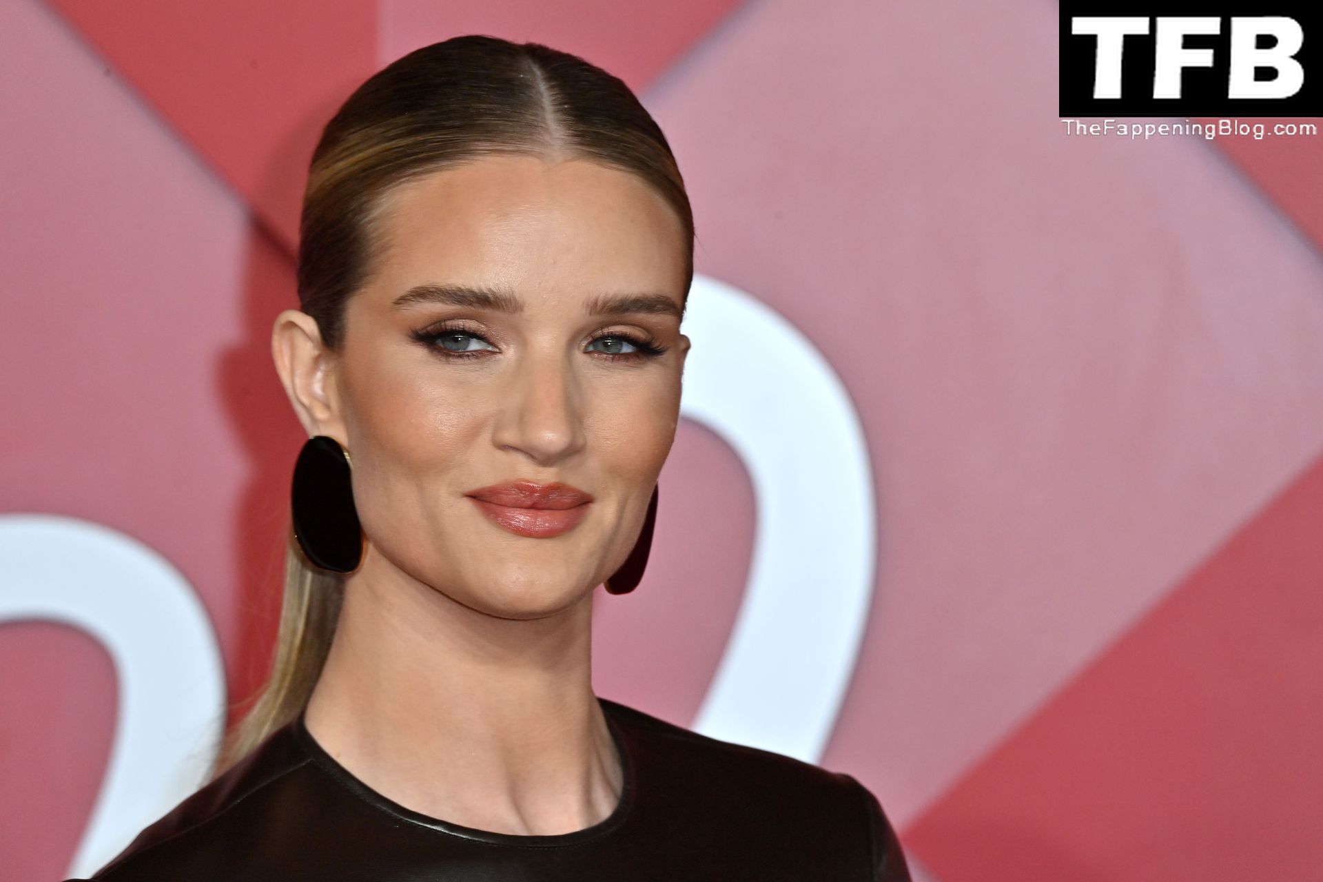 Rosie Huntington Whiteley Displays Her Pokies At The Fashion Awards In London Photos