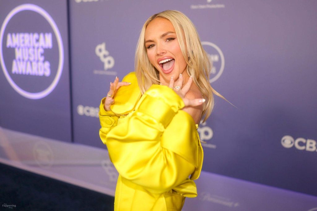 Natalie Alyn Lind Shows Off Her Sexy Tits in a Yellow Dress at the 52nd American Music Awards (35 Photos) 33